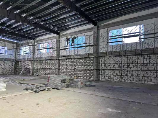 Single Span Pre‑engineered Steel Building Textile Factory Workshop Side Access Door Units Galvanized Steel Columns On‑site Erection